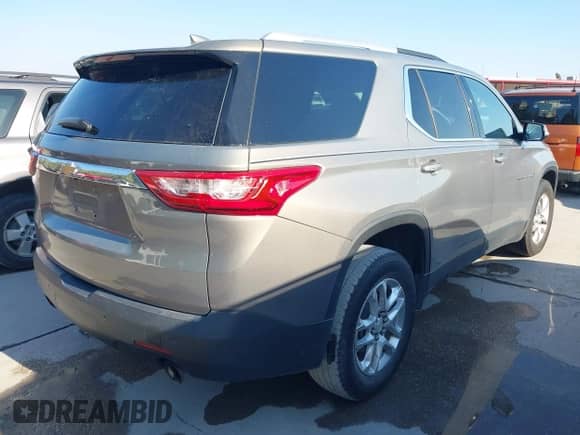 2018 Chevrolet Traverse LT Cloth z VIN 1GNERGKW3JJ209693, wystawiony jako IAAI lot #43443294 z przebiegiem 105 300 mil mil oraz . Historia ofert i sprzedaży dostępna na DreamBid. Obrazek 4.