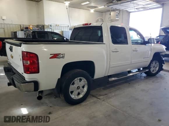 2012 Chevrolet Silverado 1500 LTZ with VIN 1GCPKTE71CF122304, listed as a Copart auction lot 85088215 with 217,510 mi miles and Salvage title. Bid and sale history available at DreamBid. Image 3.