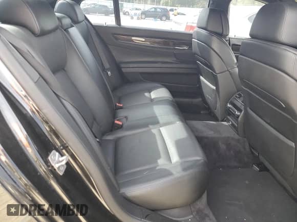 2011 BMW 7 Series with VIN WBAKX8C52BC198377, listed as a Copart auction lot 70003444 with 173,725 mi miles and Salvage title. Bid and sale history available at DreamBid. Image 10.