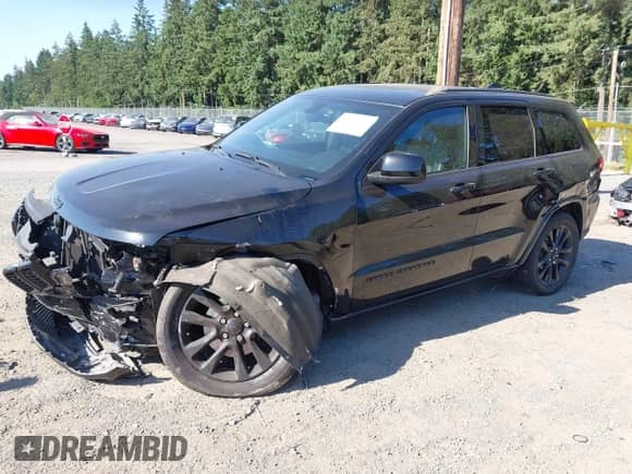 2018 Jeep Grand Cherokee Upland z VIN 1C4RJFAG2JC264565, wystawiony jako IAAI lot #42677466 z przebiegiem 124 860 mil mil oraz . Historia ofert i sprzedaży dostępna na DreamBid. Obrazek 18.