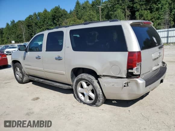 2007 Chevrolet Suburban LTZ с VIN 3GNFK16347G317059, выставлен на аукционе Copart как лот 81213085 с пробегом 202 394 миль миль и Списание • Salvage title. История ставок и продаж доступна на DreamBid. Изображение 2.