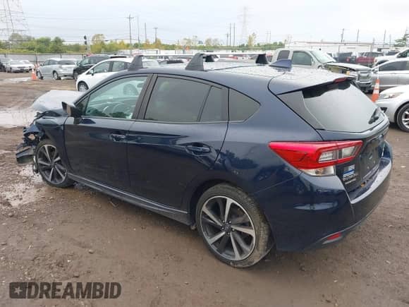 2021 Subaru Impreza Special Sports with VIN 4S3GTAL6XM3704691, listed as a IAAI auction lot 43277055 with 51,895 mi miles and . Bid and sale history available at DreamBid. Image 3.
