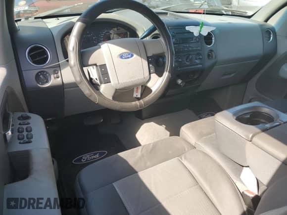2007 Ford F-150 XLT с VIN 1FTPX14V57FB20910, выставлен на аукционе Copart как лот 84879325 с пробегом 100 780 миль миль и Списание • Salvage title. История ставок и продаж доступна на DreamBid. Изображение 8.