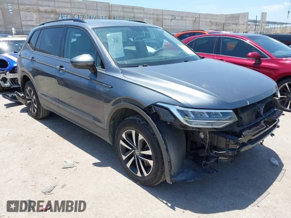 2022 Volkswagen Tiguan S z VIN 3VV1B7AX2NM005158, wystawiony jako IAAI lot #42512832 z przebiegiem 49 491 mil mil oraz . Historia ofert i sprzedaży dostępna na DreamBid. Obrazek 1.