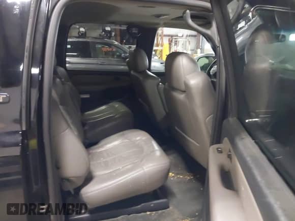 2002 Chevrolet Suburban Z71 with VIN 3GNFK16Z42G305930, listed as a IAAI auction lot 41002347 with 288,355 mi miles and . Bid and sale history available at DreamBid. Image 8.