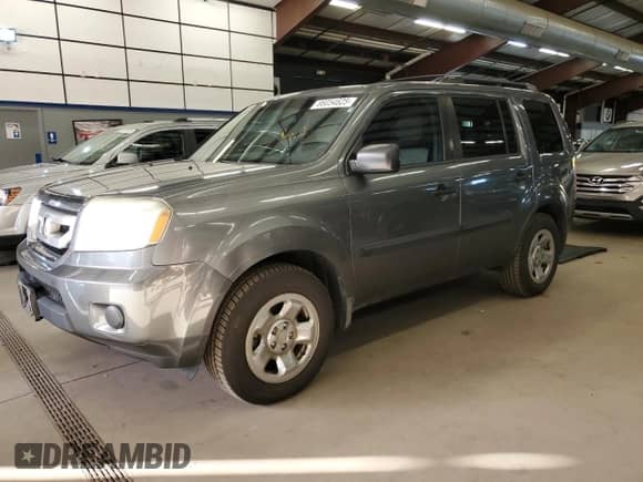 2009 Honda Pilot LX with VIN 5FNYF38219B009703, listed as a Copart auction lot 86054625 with 215,143 mi miles and Clean title. Bid and sale history available at DreamBid. Image 1.