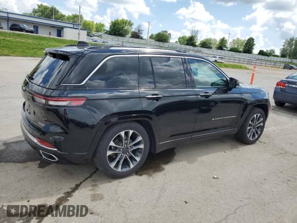 2023 Jeep Grand Cherokee Overland z VIN 1C4RJHDG0PC670537, wystawiony jako Copart lot #56757285 z przebiegiem 24 735 mil mil oraz Szkoda całkowita • Salvage title. Historia ofert i sprzedaży dostępna na DreamBid. Obrazek 3.