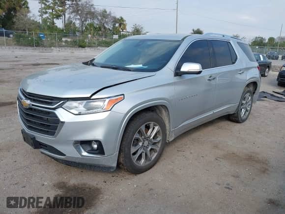 2021 Chevrolet Traverse Premier with VIN 1GNEVKKW9MJ213346, listed as a IAAI auction lot 41591024 with 112,803 mi miles and . Bid and sale history available at DreamBid. Image 17.