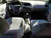 2000 Hyundai Elantra GLS z VIN KMHJF35F0YU935049, wystawiony jako Copart lot #71959385 z przebiegiem 119 494 mil mil oraz Szkoda całkowita • Salvage title. Historia ofert i sprzedaży dostępna na DreamBid. Obrazek 8.