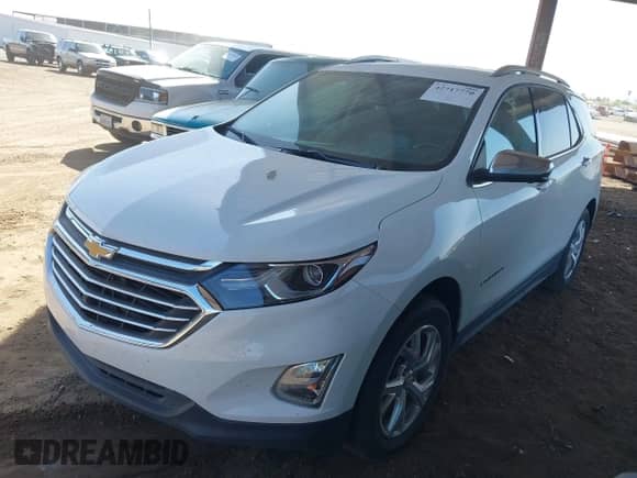 2021 Chevrolet Equinox Premier with VIN 3GNAXXEV6MS162086, listed as a IAAI auction lot 42717770 with 79,187 mi miles and . Bid and sale history available at DreamBid. Image 2.