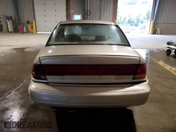 1996 Saturn SL with VIN 1G8ZK5274TZ233706, listed as a Copart auction lot 54247795 with 62,941 mi miles and Clean title. Bid and sale history available at DreamBid. Image 6.