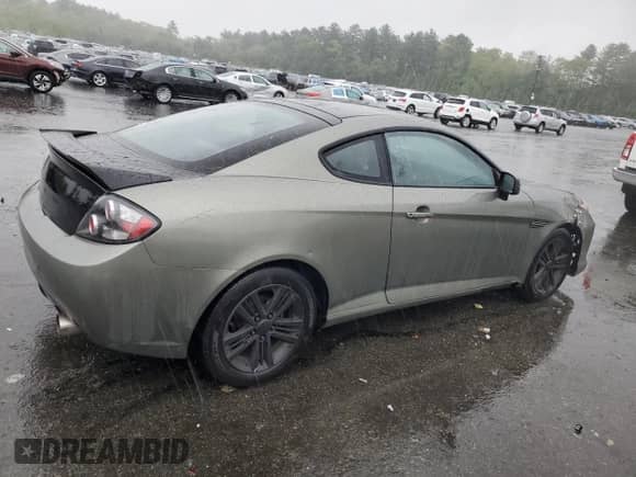 2008 Hyundai Tiburon GS с VIN KMHHM66D18U264820, выставлен на аукционе Copart как лот 54485415 с пробегом 158 129 миль миль и Списание • Salvage title. История ставок и продаж доступна на DreamBid. Изображение 3.