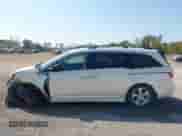 2012 Honda Odyssey Touring with VIN 5FNRL5H9XCB145597, listed as a IAAI auction lot 43247934 with 257,447 mi miles and . Bid and sale history available at DreamBid. Image 15.