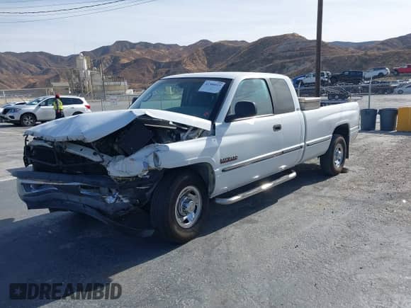1999 Dodge 2500 with VIN 1B7KC2362XJ593196, listed as a IAAI auction lot 41388015 with 466,535 mi miles and . Bid and sale history available at DreamBid. Image 2.