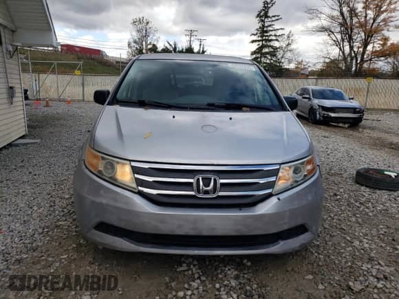 2012 Honda Odyssey LX with VIN 5FNRL5H22CB101919, listed as a Copart auction lot 82742425 with 157,279 mi miles and Clean title. Bid and sale history available at DreamBid. Image 5.