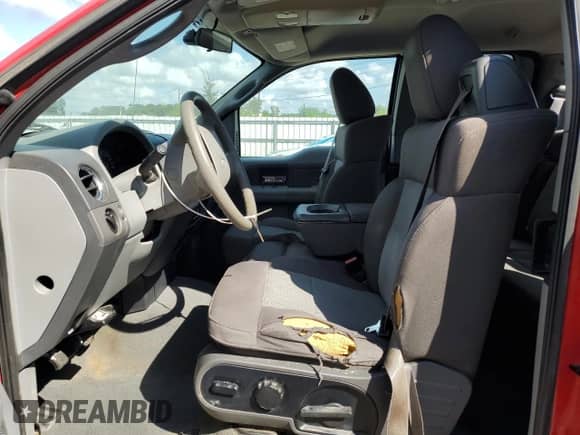 2005 Ford F-150 XLT with VIN 1FTPX12535FA55636, listed as a Copart auction lot 83793145 with 204,252 mi miles and Salvage title. Bid and sale history available at DreamBid. Image 7.