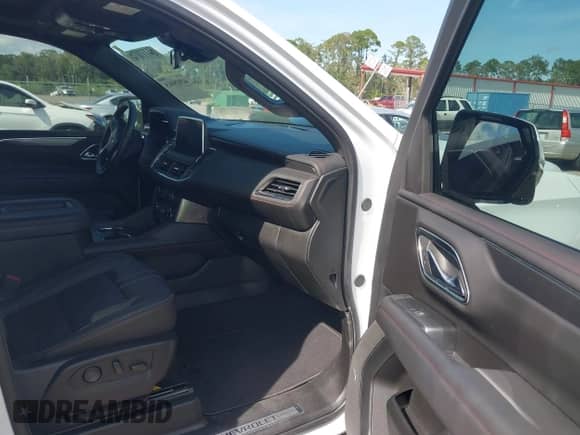 2024 Chevrolet Tahoe RST with VIN 1GNSCRKD2RR417057, listed as a IAAI auction lot 42925915 with 13,841 mi miles and . Bid and sale history available at DreamBid. Image 5.
