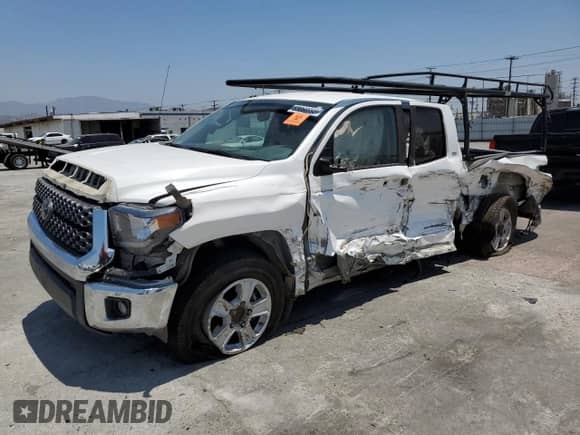 2019 Toyota Tundra SR с VIN 5TFRM5F14KX143150, выставлен на аукционе Copart как лот 63068995 с пробегом Не указан миль и Списание • Salvage title. История ставок и продаж доступна на DreamBid. Изображение 1.