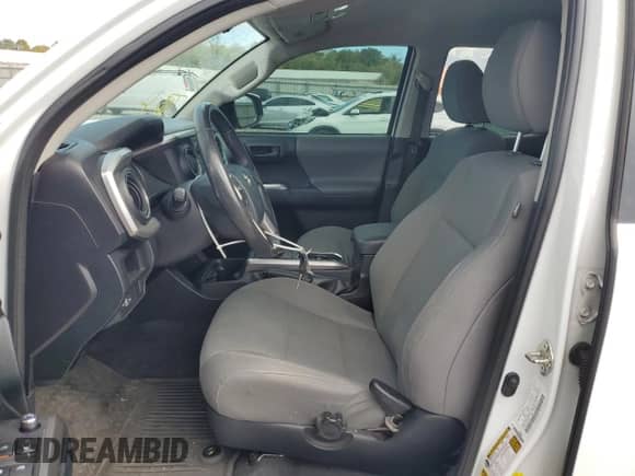 2016 Toyota Tacoma SR5 с VIN 5TFAZ5CN9GX005231, выставлен на аукционе Copart как лот 84800115 с пробегом 114 094 миль миль и Списание • Salvage title. История ставок и продаж доступна на DreamBid. Изображение 7.