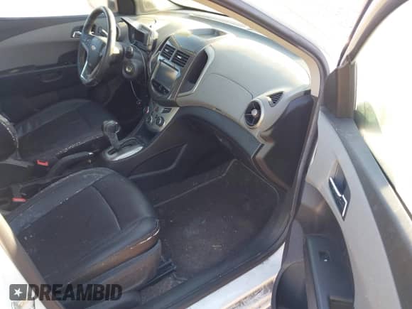 2014 Chevrolet Sonic LTZ with VIN 1G1JE6SB7E4186829, listed as a IAAI auction lot 43152587 with 100,844 mi miles and . Bid and sale history available at DreamBid. Image 5.