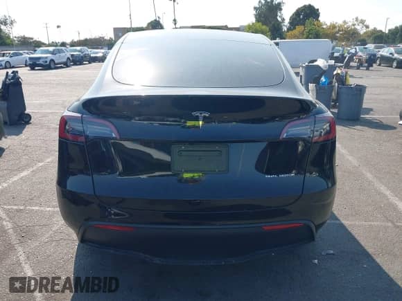 2023 Tesla Model Y Long Range z VIN 7SAYGAEE9PF851348, wystawiony jako IAAI lot #43167064 z przebiegiem Nie podano mil oraz . Historia ofert i sprzedaży dostępna na DreamBid. Obrazek 16.