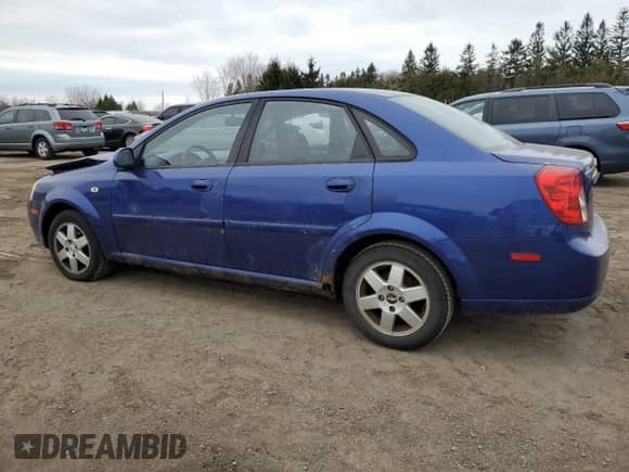 2005 Chevrolet Optra LS с VIN KL1JK59Z85K144184, выставлен на аукционе Copart как лот 48537625 с пробегом 346 711 миль миль и Списание • Salvage title. История ставок и продаж доступна на DreamBid. Изображение 2.