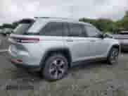 2023 Jeep Grand Cherokee with VIN 1C4RJYB64PC649720, listed as a Copart auction lot 84032325 with 59,572 mi miles and Clean title. Bid and sale history available at DreamBid. Image 3.