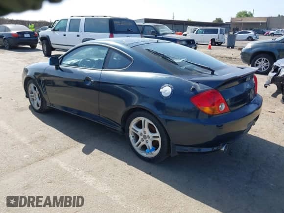 2003 Hyundai Tiburon GT с VIN KMHHN65F83U034197, выставлен на аукционе IAAI как лот 42383077 с пробегом 138 877 миль миль и . История ставок и продаж доступна на DreamBid. Изображение 3.