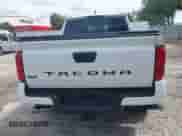 2025 Toyota Tacoma SR5 with VIN 3TMKB5FN2SM028806, listed as a IAAI auction lot 43258727 with 10,320 mi miles and . Bid and sale history available at DreamBid. Image 16.