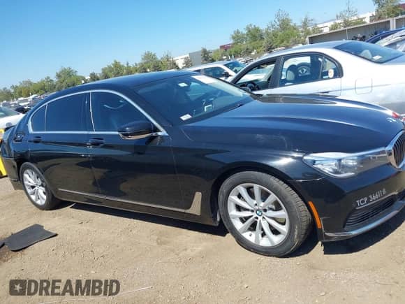 2019 BMW 7 Series 740i with VIN WBA7E2C50KB216826, listed as a IAAI auction lot 39659011 with Not provided miles and . Bid and sale history available at DreamBid. Image 13.