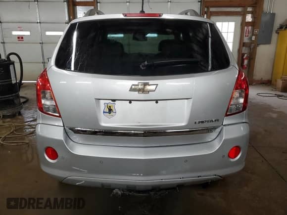 2013 Chevrolet Captiva Sport LTZ с VIN 3GNAL4EK0DS598187, выставлен на аукционе Copart как лот 78989134 с пробегом 107 198 миль миль и Списание • Salvage title. История ставок и продаж доступна на DreamBid. Изображение 6.