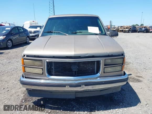 1994 GMC Sierra 1500 z VIN 2GTEC19K7R1555049, wystawiony jako IAAI lot #42316465 z przebiegiem 242 883 mil mil oraz . Historia ofert i sprzedaży dostępna na DreamBid. Obrazek 12.