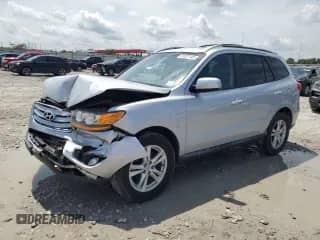 2010 Hyundai Santa Fe Limited with VIN 5NMSK4AG4AH342252, listed as a Copart auction lot 61027145 with 137,178 mi miles and Salvage title. Bid and sale history available at DreamBid. Image 1.