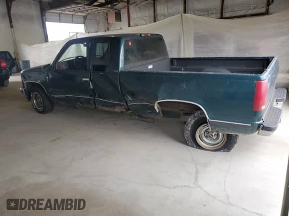 1995 GMC Sierra 1500 z VIN 2GTEC19K2S1558740, wystawiony jako Copart lot #69398185 z przebiegiem 386 899 mil mil oraz Szkoda całkowita • Salvage title. Historia ofert i sprzedaży dostępna na DreamBid. Obrazek 2.