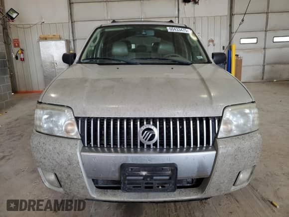 2007 Mercury Mariner Premier with VIN 4M2CU97107KJ05778, listed as a Copart auction lot 60433475 with 218,344 mi miles and Salvage title. Bid and sale history available at DreamBid. Image 5.