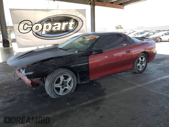 1997 Chevrolet Camaro Z28 z VIN 2G1FP22P5V2128745, wystawiony jako Copart lot #66188565 z przebiegiem Nie podano mil oraz Szkoda całkowita • Salvage title. Historia ofert i sprzedaży dostępna na DreamBid. Obrazek 1.