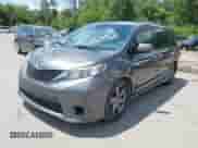 2014 Toyota Sienna SE with VIN 5TDXK3DC8ES443113, listed as a IAAI auction lot 42735795 with 235,269 mi miles and . Bid and sale history available at DreamBid. Image 2.