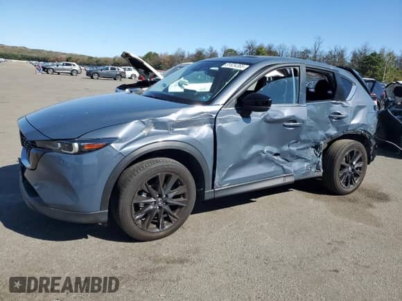 2023 Mazda CX-5 S Carbon Edition z VIN JM3KFBCM5P0219202, wystawiony jako Copart lot #81634365 z przebiegiem 24 429 mil mil oraz Szkoda całkowita • Salvage title. Historia ofert i sprzedaży dostępna na DreamBid. Obrazek 1.