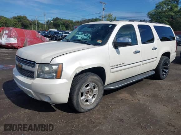 2008 Chevrolet Suburban LTZ with VIN 1GNFK16318R213808, listed as a IAAI auction lot 43287380 with 158,446 mi miles and . Bid and sale history available at DreamBid. Image 2.