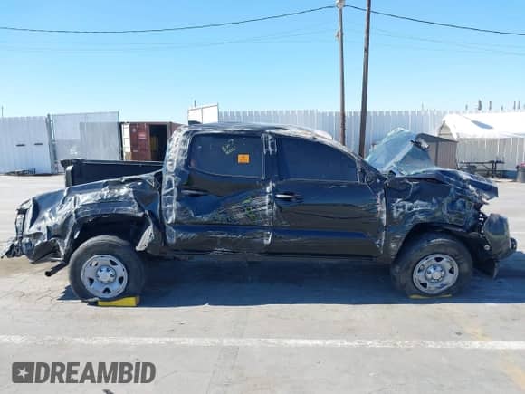 2022 Toyota Tacoma SR with VIN 3TYAX5GNXNT053716, listed as a IAAI auction lot 42853297 with 42,989 mi miles and . Bid and sale history available at DreamBid. Image 13.
