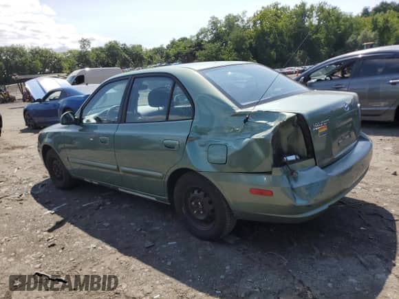 2005 Hyundai Accent GLS z VIN KMHCG45C35U622963, wystawiony jako Copart lot #68292114 z przebiegiem 137 655 mil mil oraz Szkoda całkowita • Salvage title. Historia ofert i sprzedaży dostępna na DreamBid. Obrazek 2.