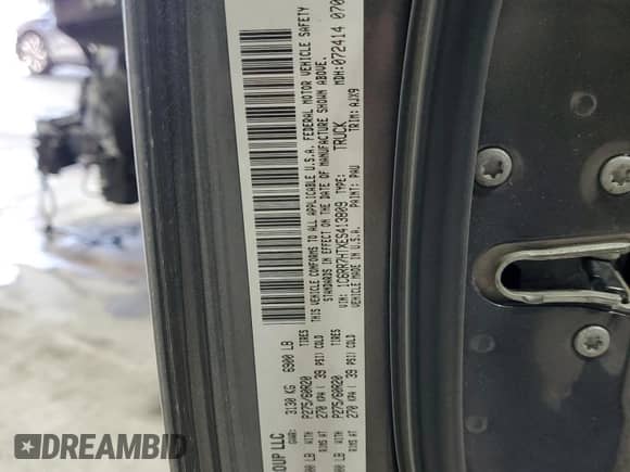 2014 Ram 1500 Sport with VIN 1C6RR7HTXES413809, listed as a Copart auction lot 52419575 with 137,609 mi miles and Salvage title. Bid and sale history available at DreamBid. Image 12.