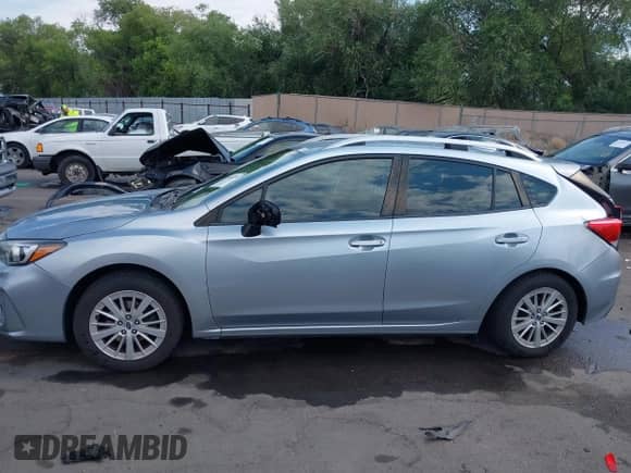2017 Subaru Impreza Premium with VIN 4S3GTAB6XH3719327, listed as a IAAI auction lot 42642944 with 106,350 mi miles and . Bid and sale history available at DreamBid. Image 14.