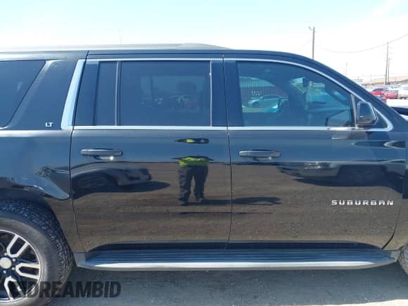 2017 Chevrolet Suburban LT with VIN 1GNSCHKC8HR115353, listed as a IAAI auction lot 42256268 with 126,472 mi miles and . Bid and sale history available at DreamBid. Image 13.