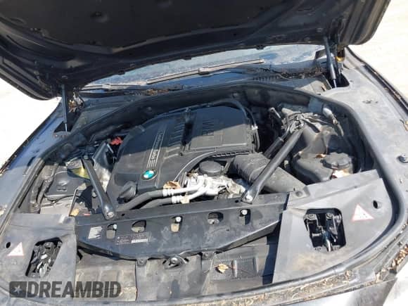 2013 BMW 7 Series 740i z VIN WBAYA6C50DD143312, wystawiony jako IAAI lot #42846115 z przebiegiem 164 978 mil mil oraz . Historia ofert i sprzedaży dostępna na DreamBid. Obrazek 10.