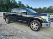 2016 Toyota Tundra Platinum with VIN 5TFGW5F16GX208427, listed as a Copart auction lot 71295365 with 150,184 mi miles and Salvage title. Bid and sale history available at DreamBid. Image 4.