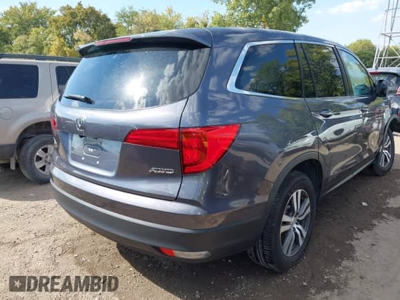 2018 Honda Pilot EX-L z VIN 5FNYF6H85JB024991, wystawiony jako IAAI lot #43194110 z przebiegiem 98 862 mil mil oraz . Historia ofert i sprzedaży dostępna na DreamBid. Obrazek 4.