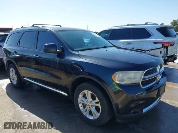2013 Dodge Durango SXT with VIN 1C4RDHAGXDC680418, listed as a IAAI auction lot 42851105 with 149,216 mi miles and . Bid and sale history available at DreamBid. Image 1.