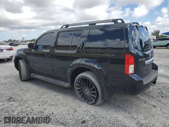 2010 Nissan Pathfinder SE with VIN 5N1AR1NN1AC616774, listed as a Copart auction lot 62059785 with 233,733 mi miles and Salvage title. Bid and sale history available at DreamBid. Image 2.