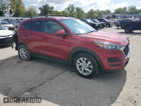 2021 Hyundai Tucson Value with VIN KM8J33A42MU406502, listed as a Copart auction lot 83878815 with 126,612 mi miles and Salvage title. Bid and sale history available at DreamBid. Image 4.